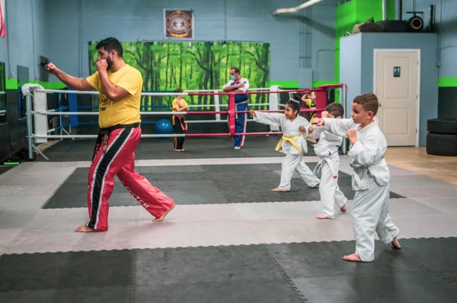 Kids learning sportsmanship through martial arts