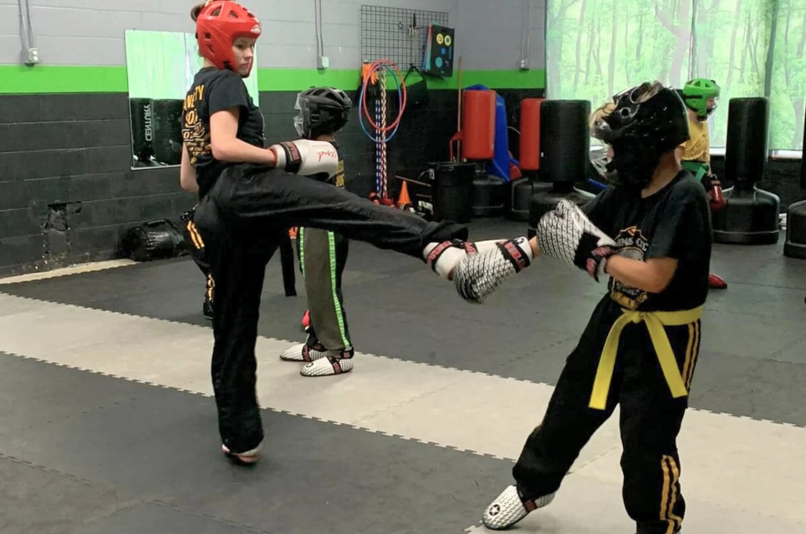Child building confidence in martial arts