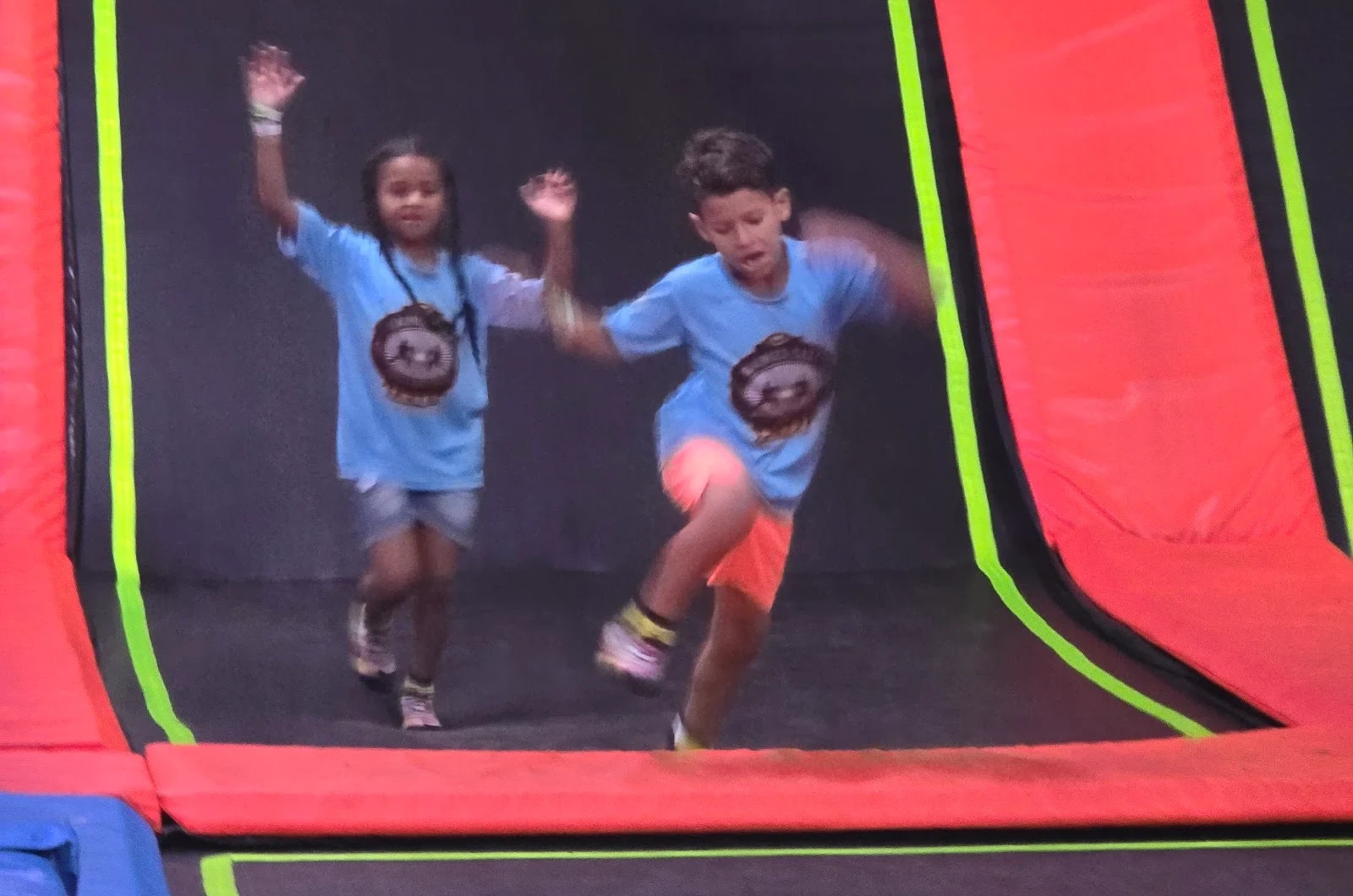 Kids making friends at summer camp at Haines City Sports Karate Center
